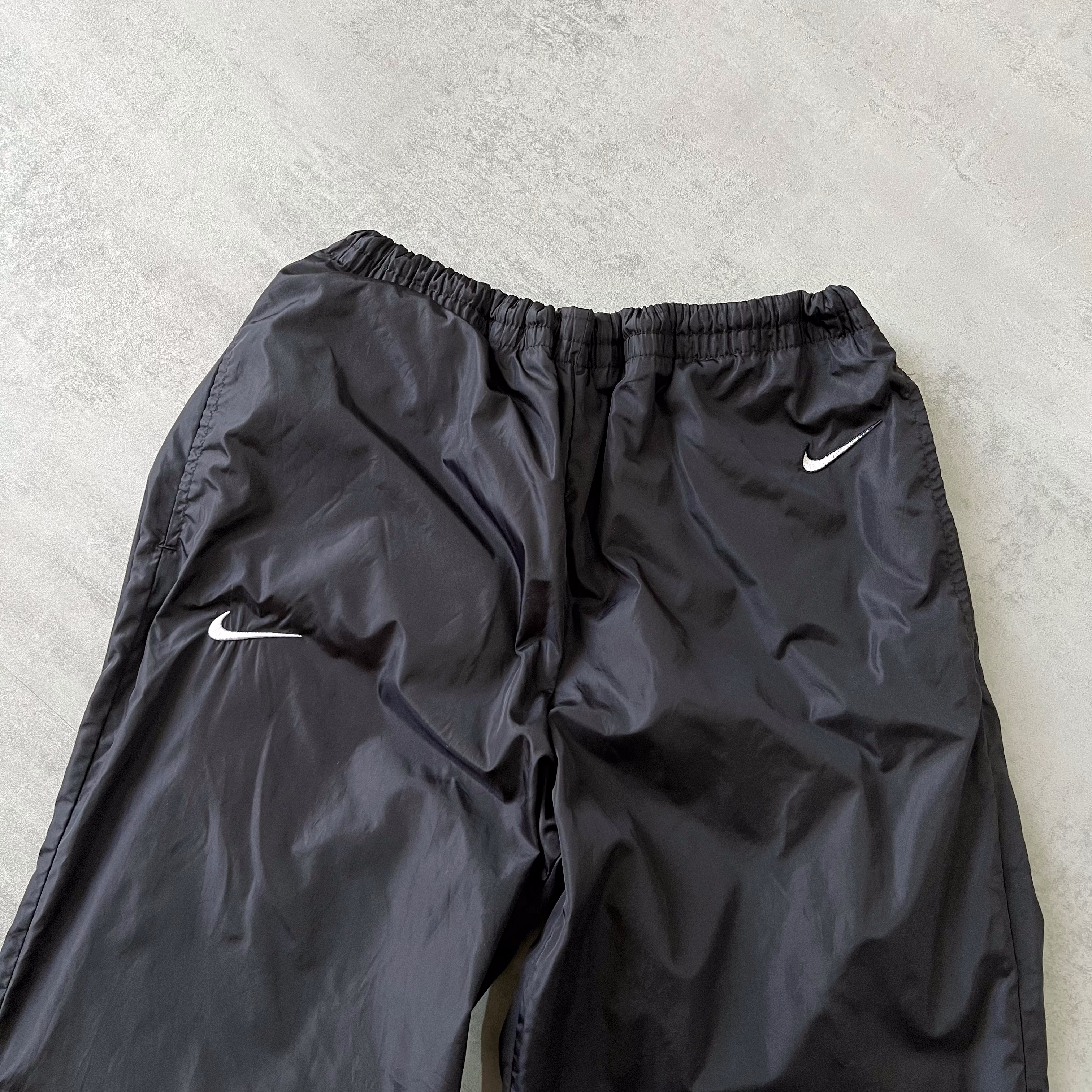 Nike 1990s double swoosh trackpants (M)