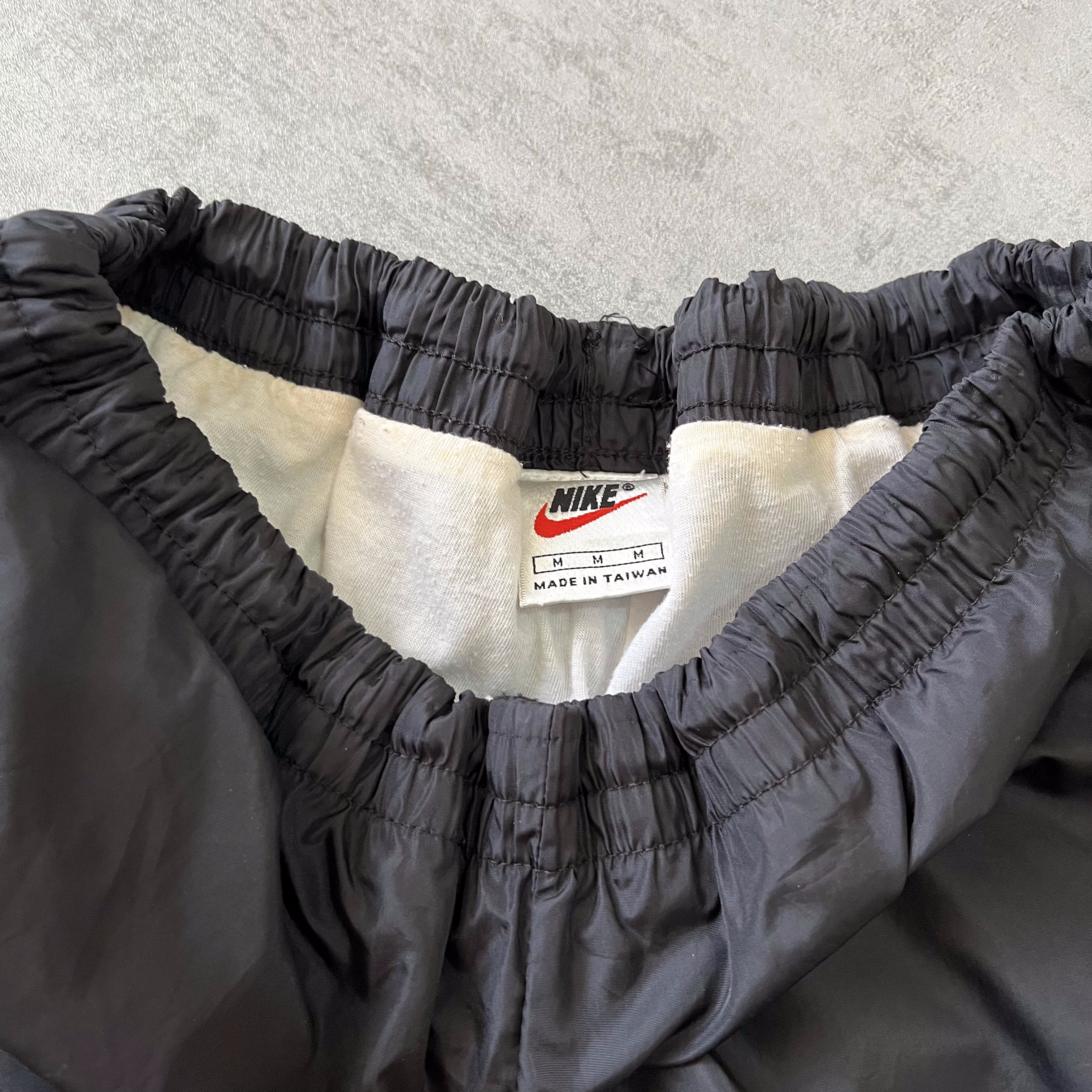 Nike 1990s double swoosh trackpants (M)