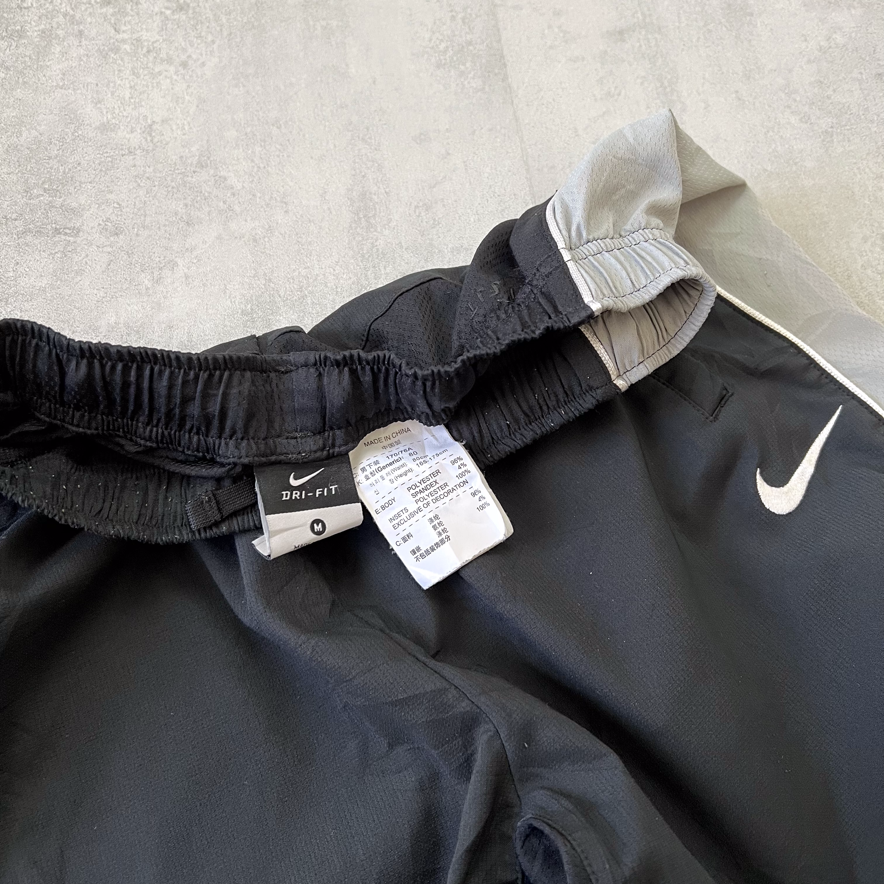 Nike RARE 2000s trackpants (M)