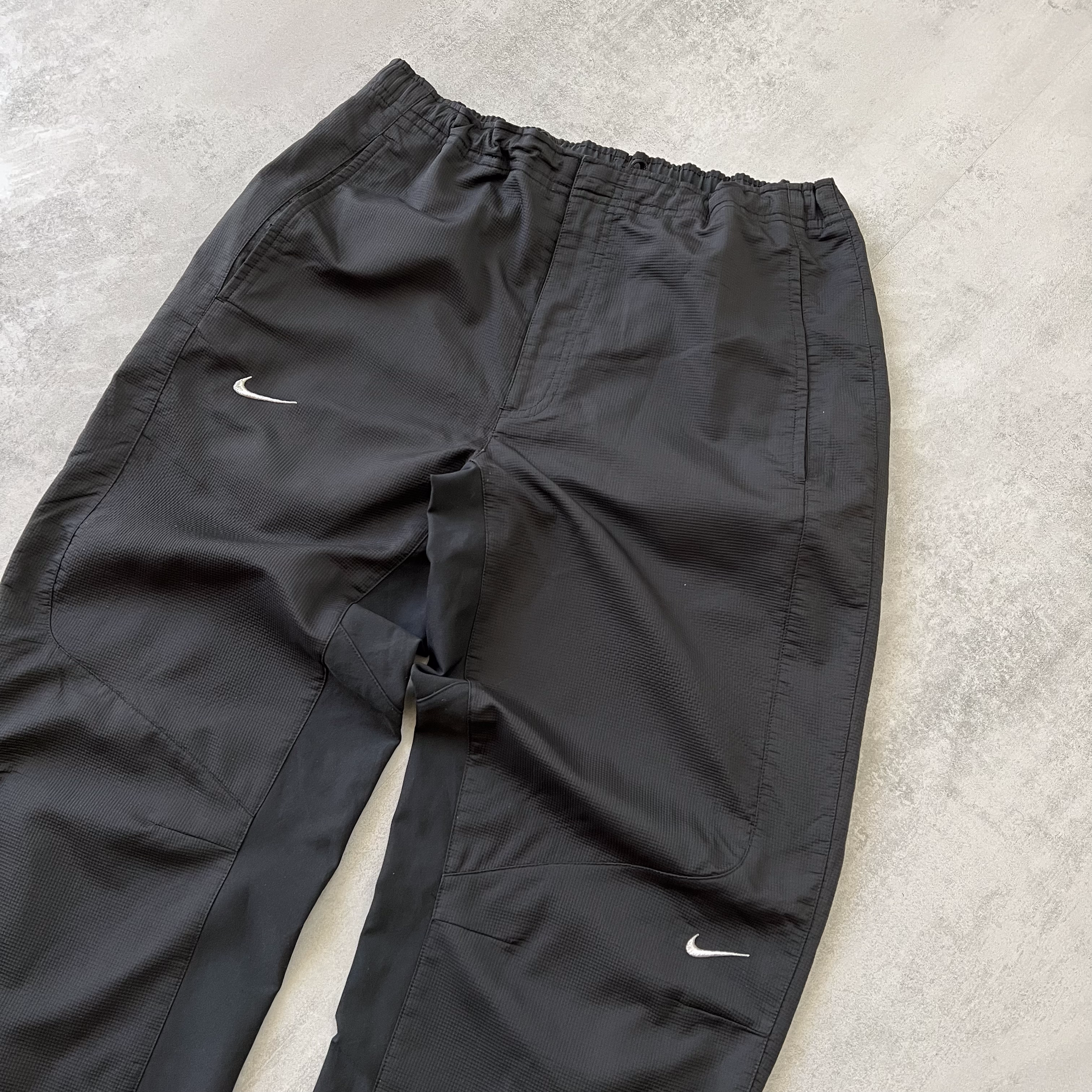 Nike 2000s double swoosh trackpants (M)