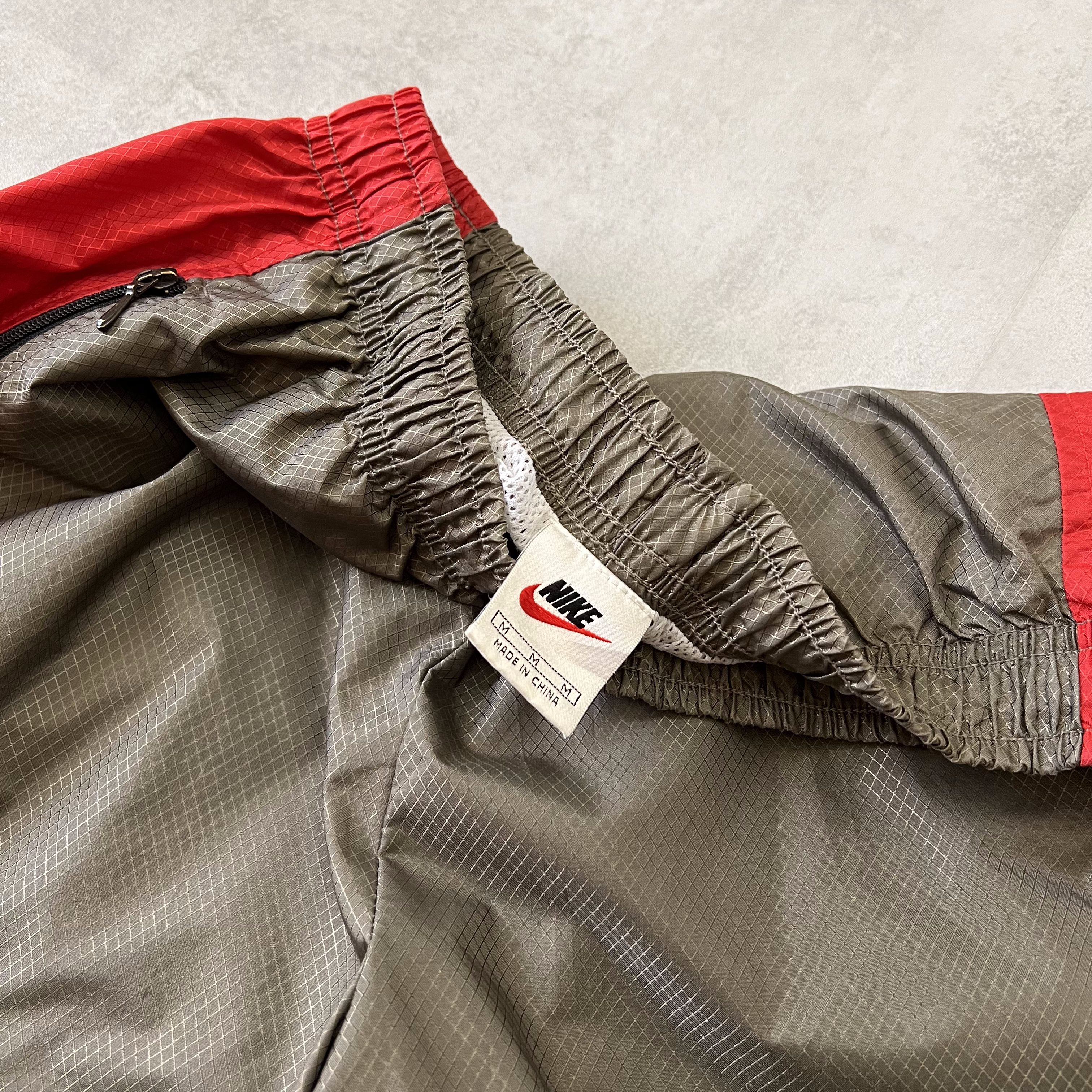 Nike 2000s double swoosh trackpants (M)