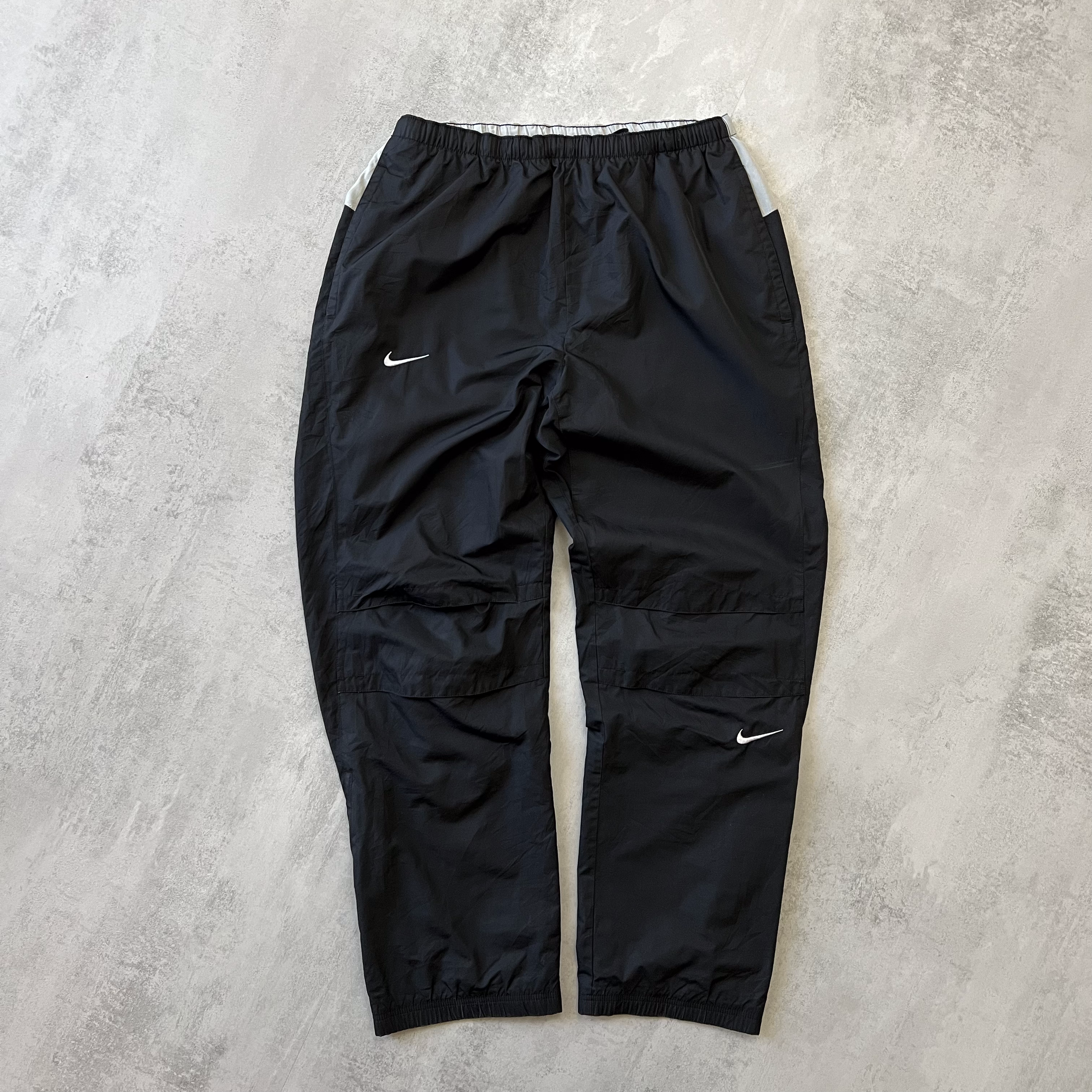 Nike 2000s double swoosh trackpants (L)