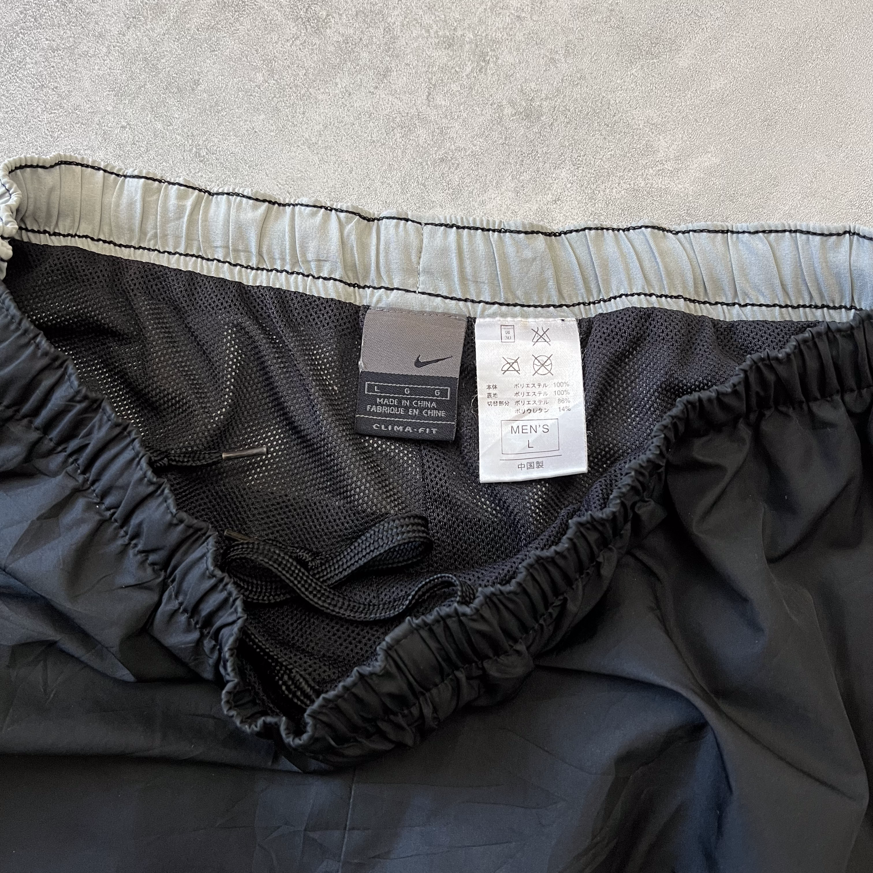 Nike 2000s double swoosh trackpants (L)