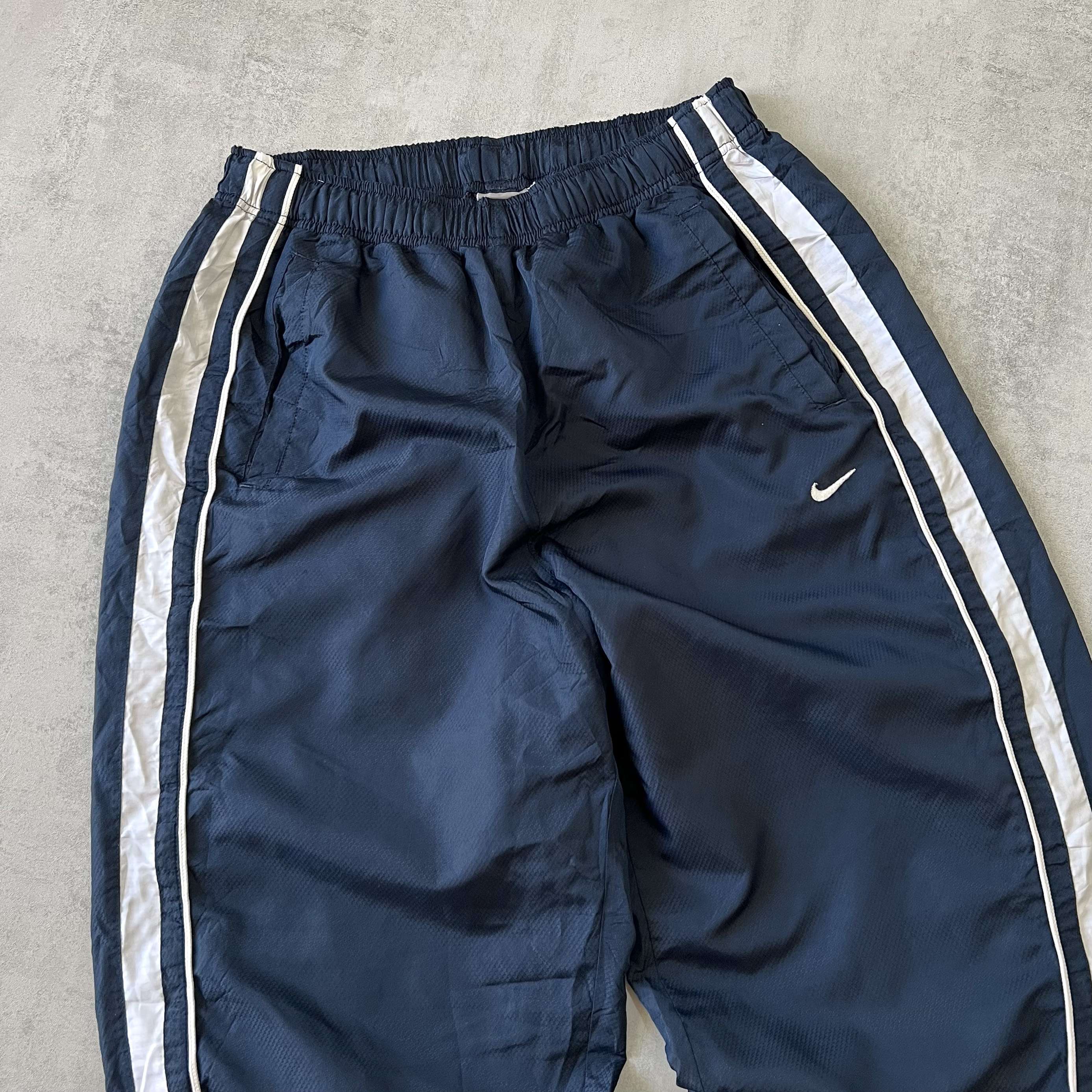 Nike 1990s striped trackpants (M)