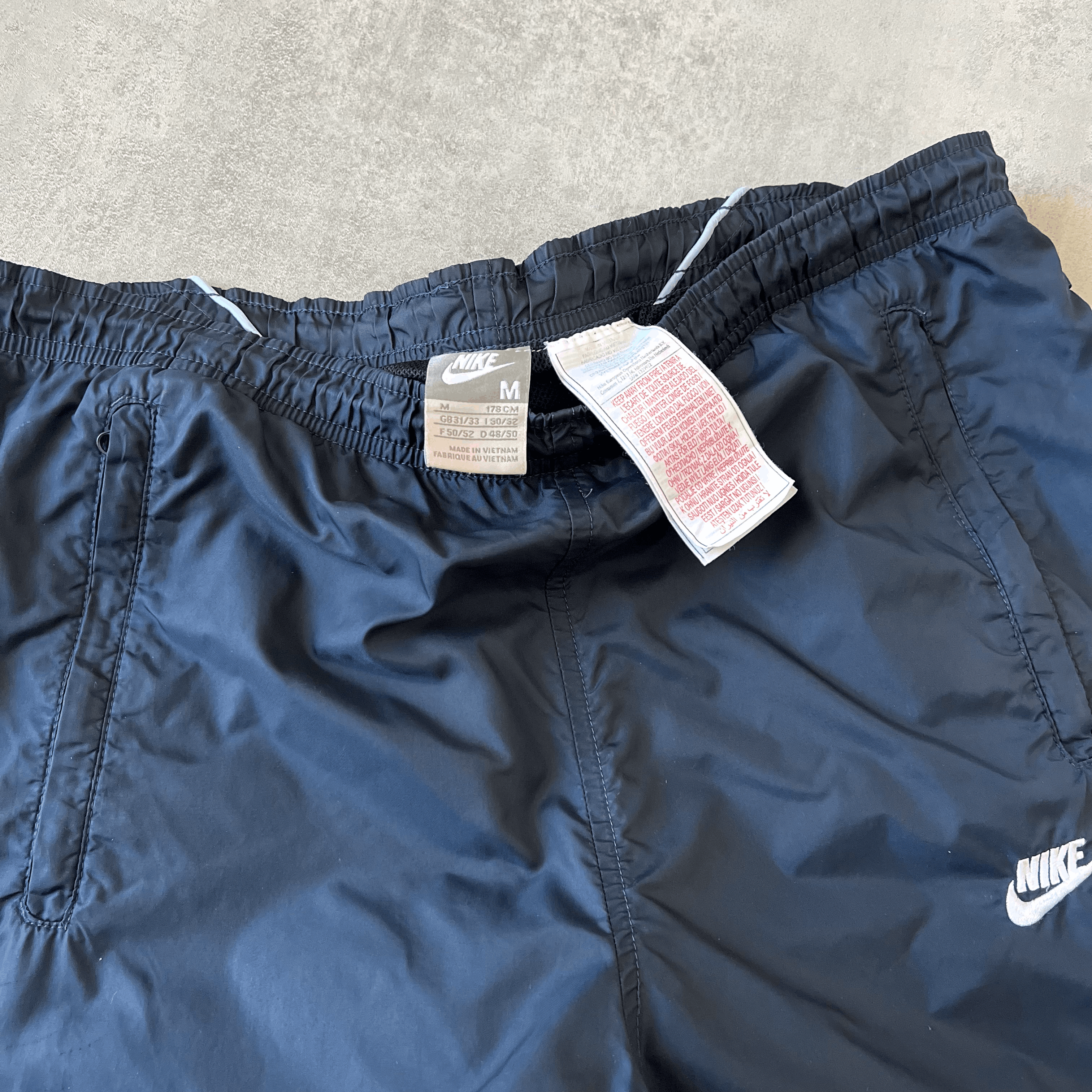 Nike RARE 2000s double swoosh trackpants (M)