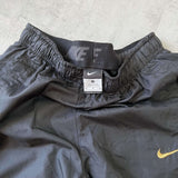 Nike 2000s track pants (M)