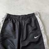 Nike RARE 2000s track pants (L)