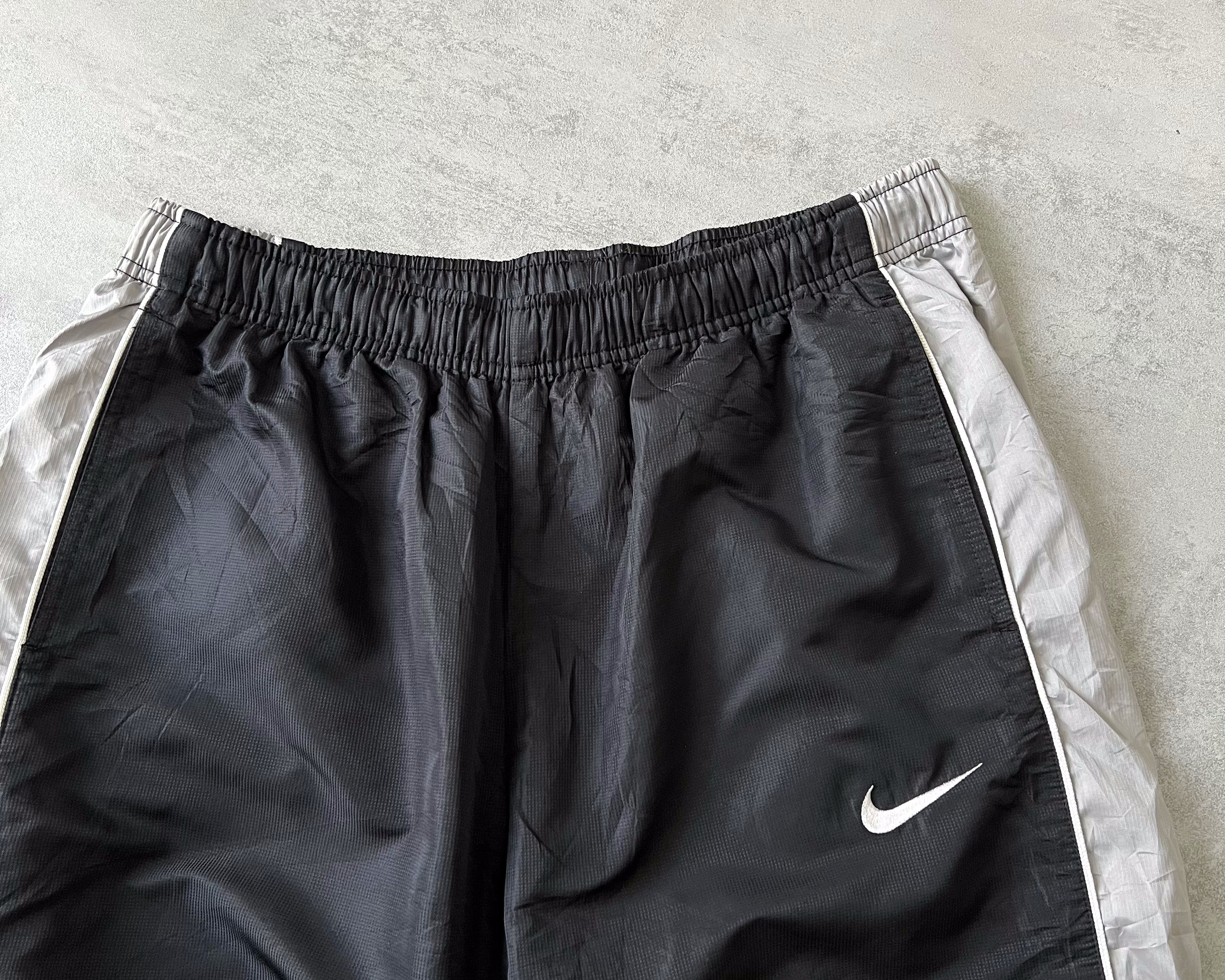 Nike RARE 2000s track pants (L)