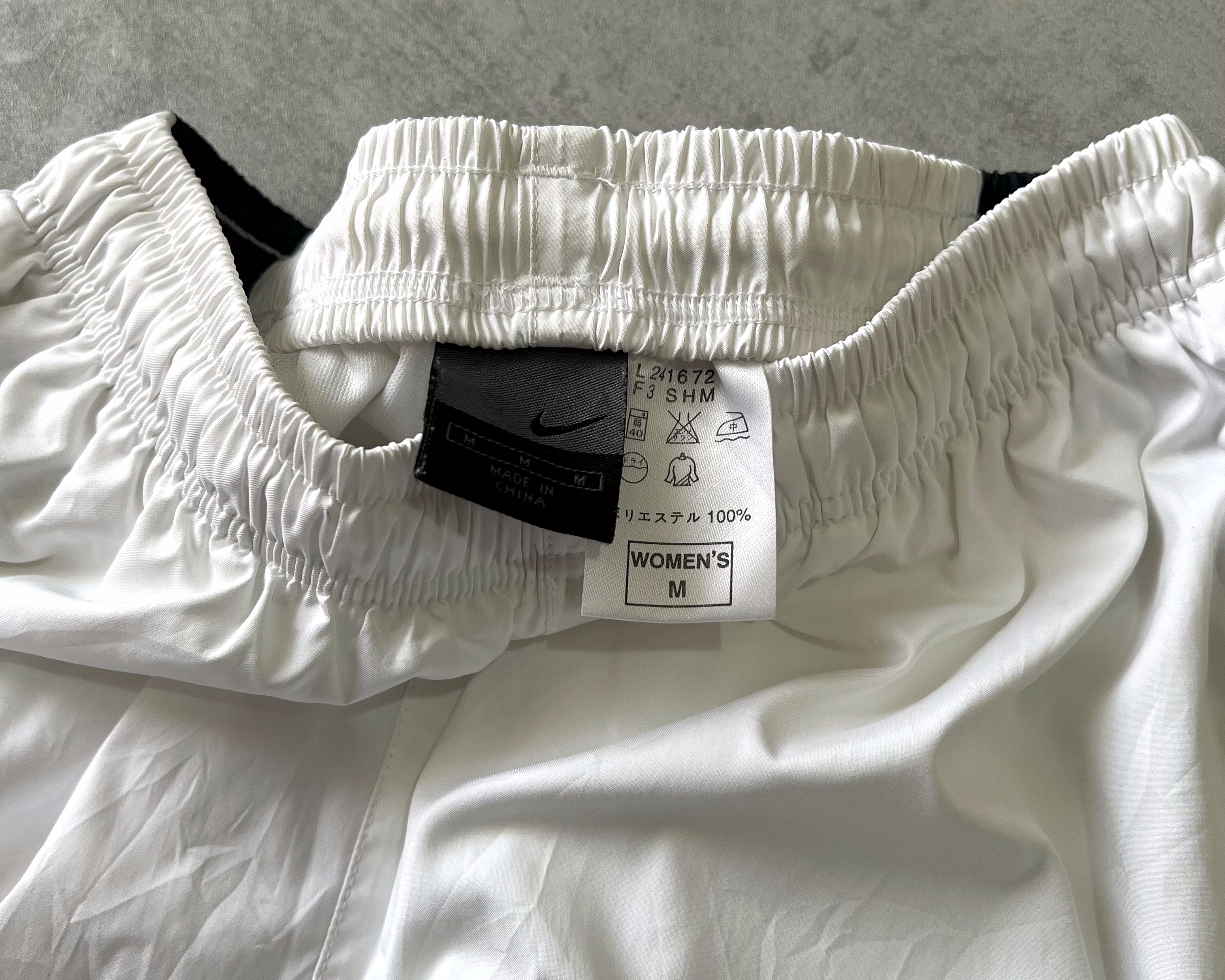 Nike 2000s track pants (M)