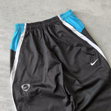 Nike RARE 2000s track pants (L)