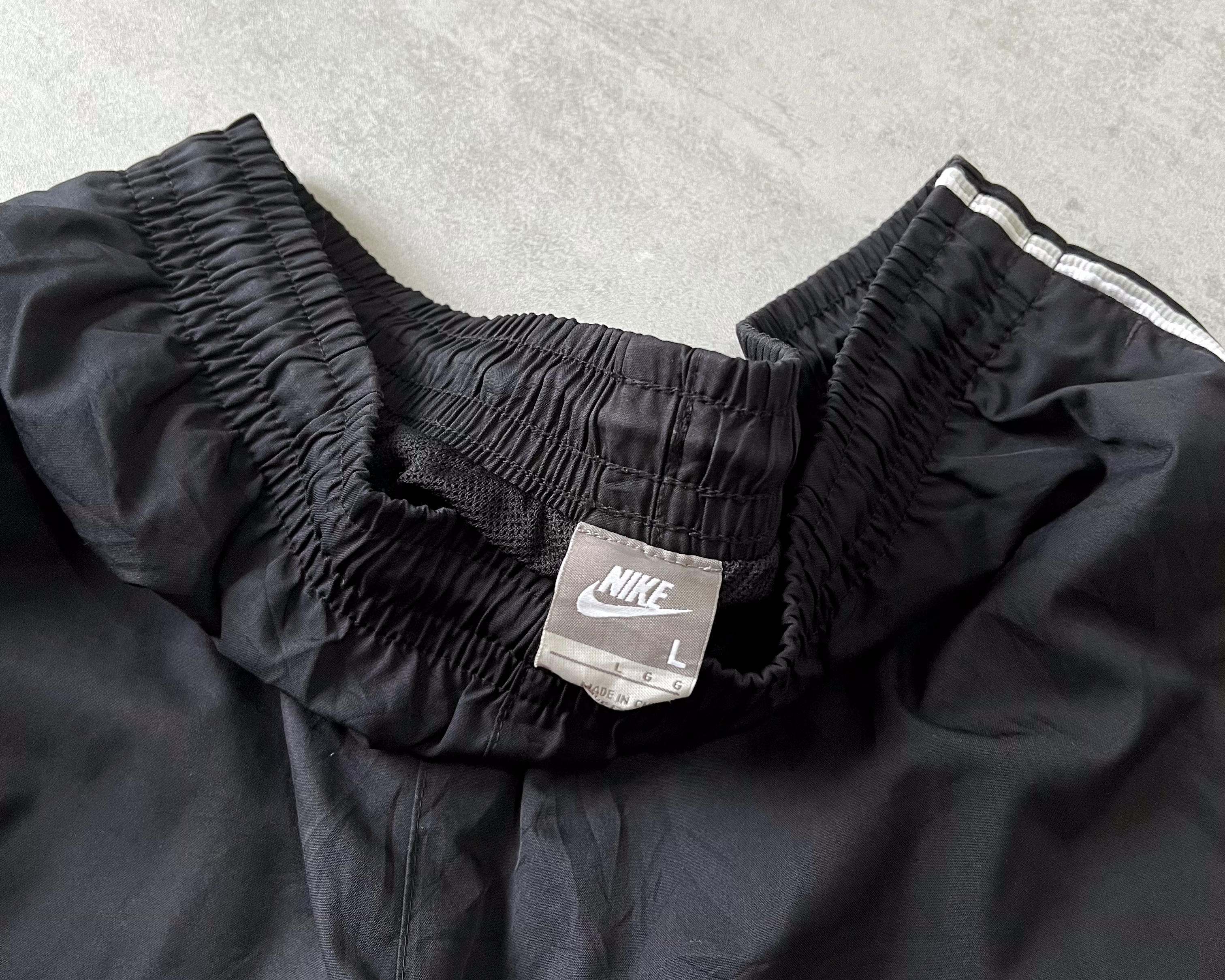Nike 2000s track pants (L)