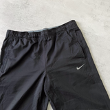 Nike 2000s track pants (M)