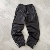 Nike 1990s double swoosh track pants (M)