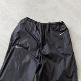 Nike 1990s double swoosh track pants (M)