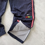 Nike 2000s track pants (L)