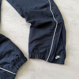 Nike RARE 2000s track pants (L)