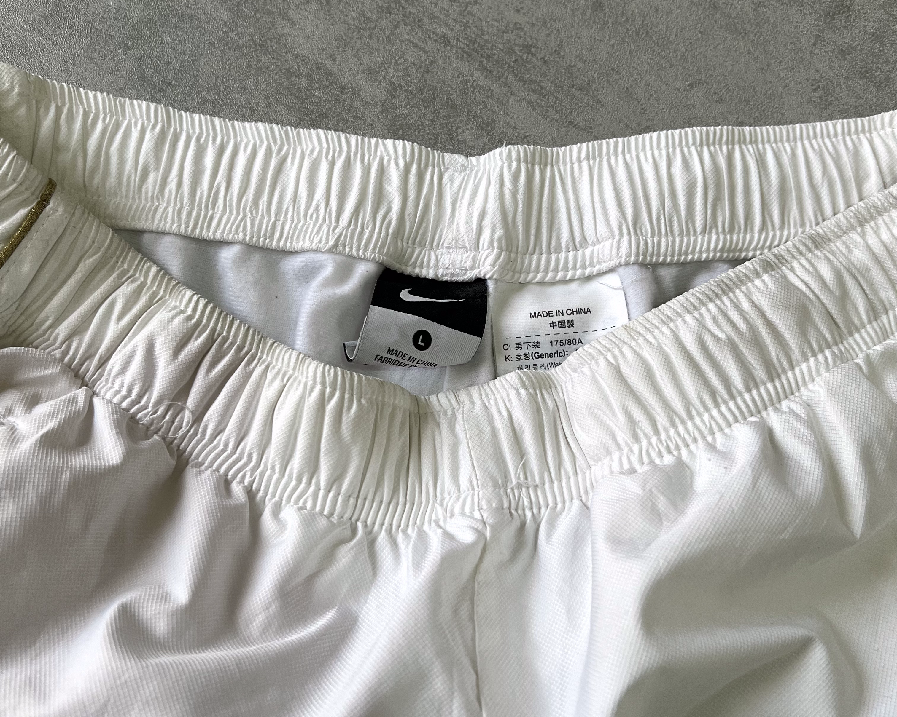 Nike 2000s track pants (L)