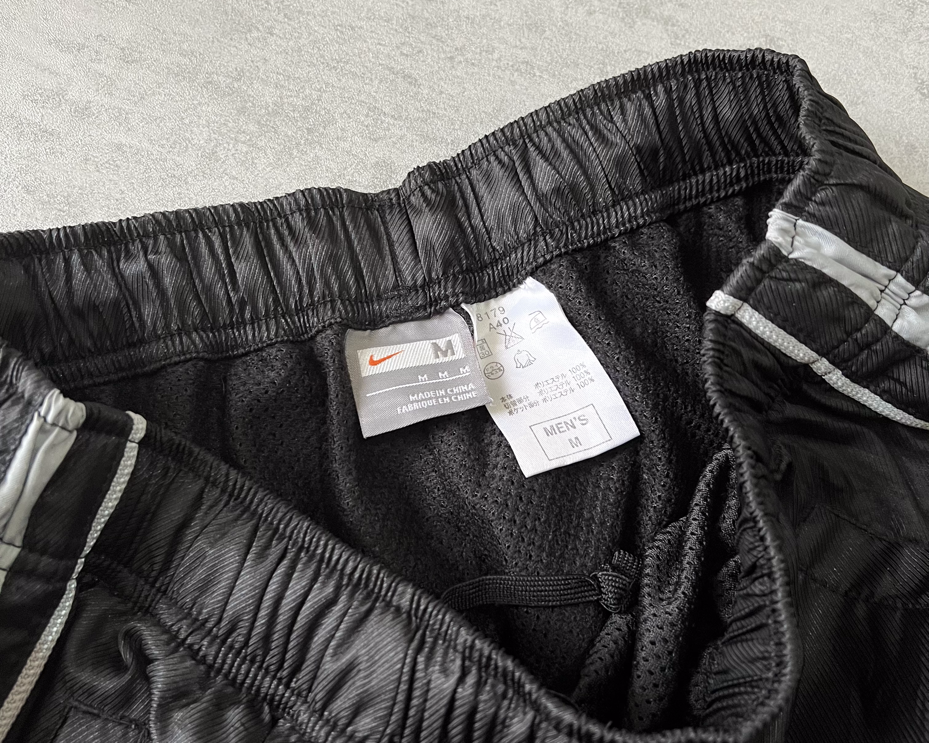 Nike 2000s track pants (M)