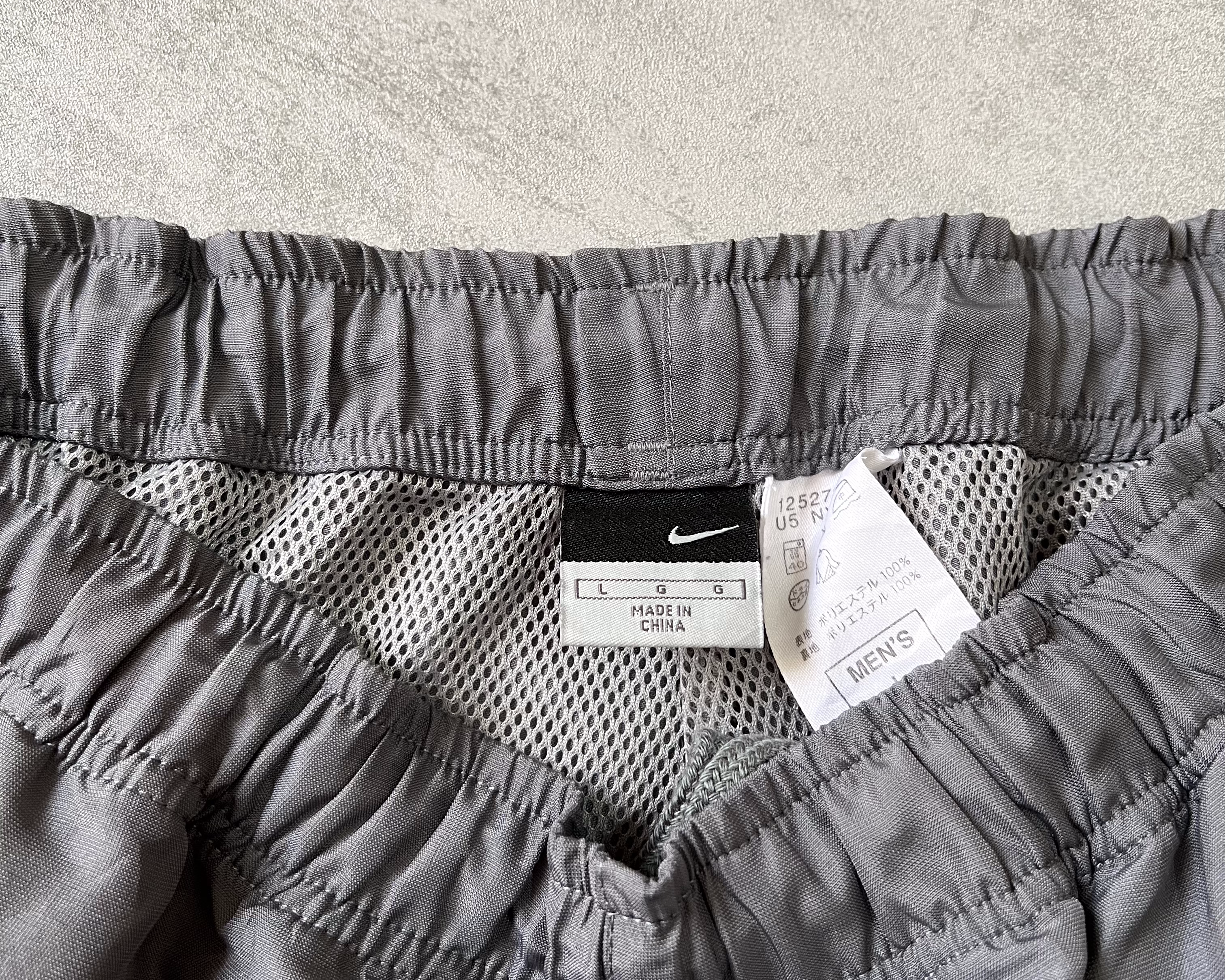 Nike 2000s track pants (L)