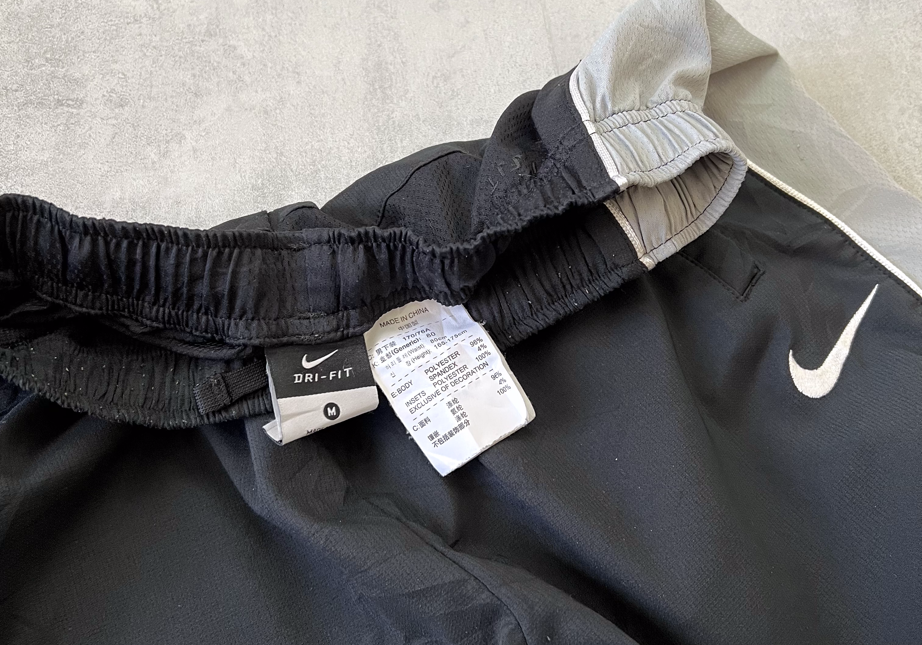 Nike RARE 2000s trackpants (M)