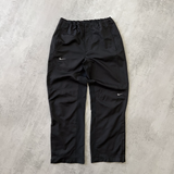 Nike 2000s double swoosh trackpants (M)