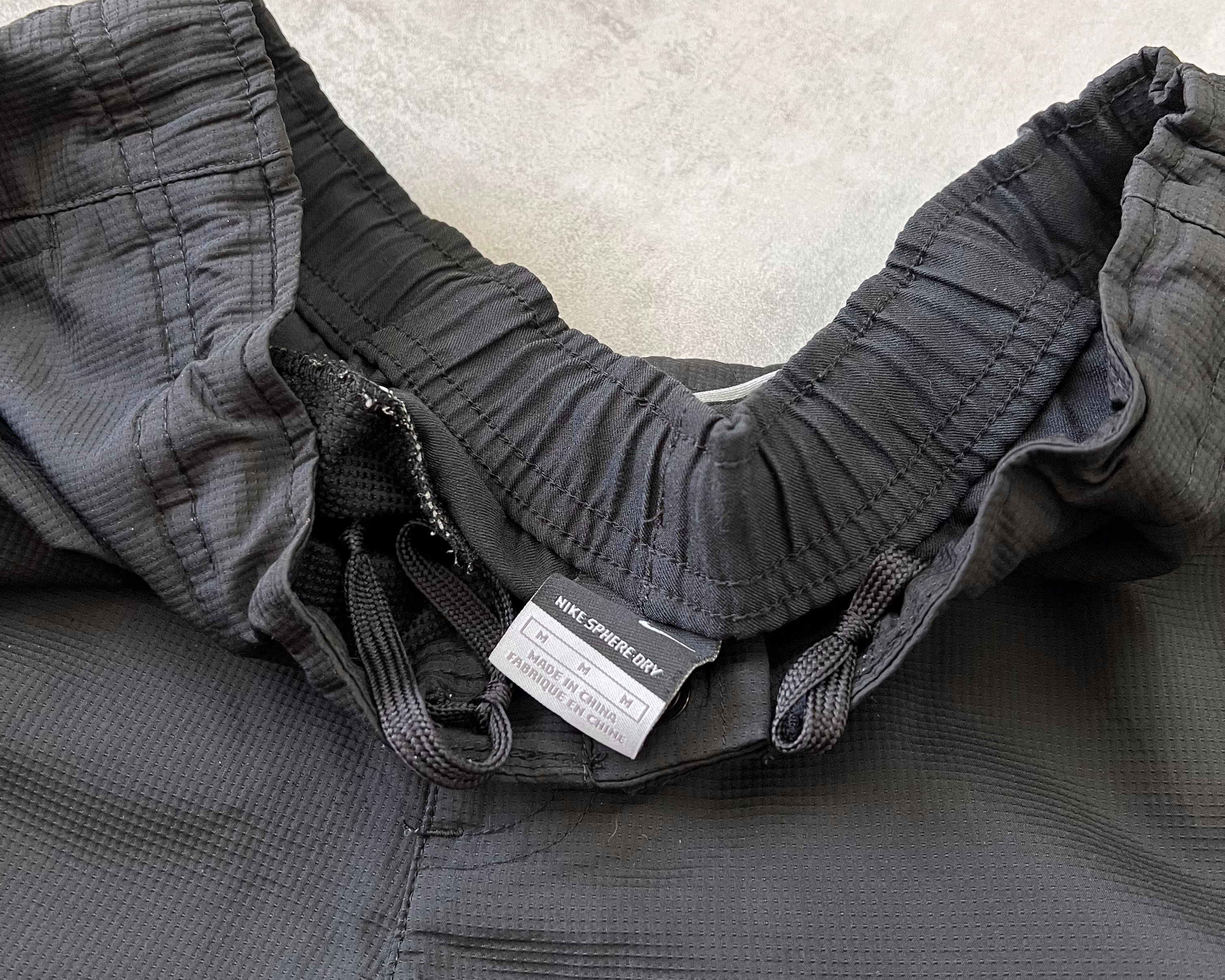 Nike 2000s double swoosh trackpants (M)