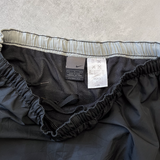 Nike 2000s double swoosh track pants (L)