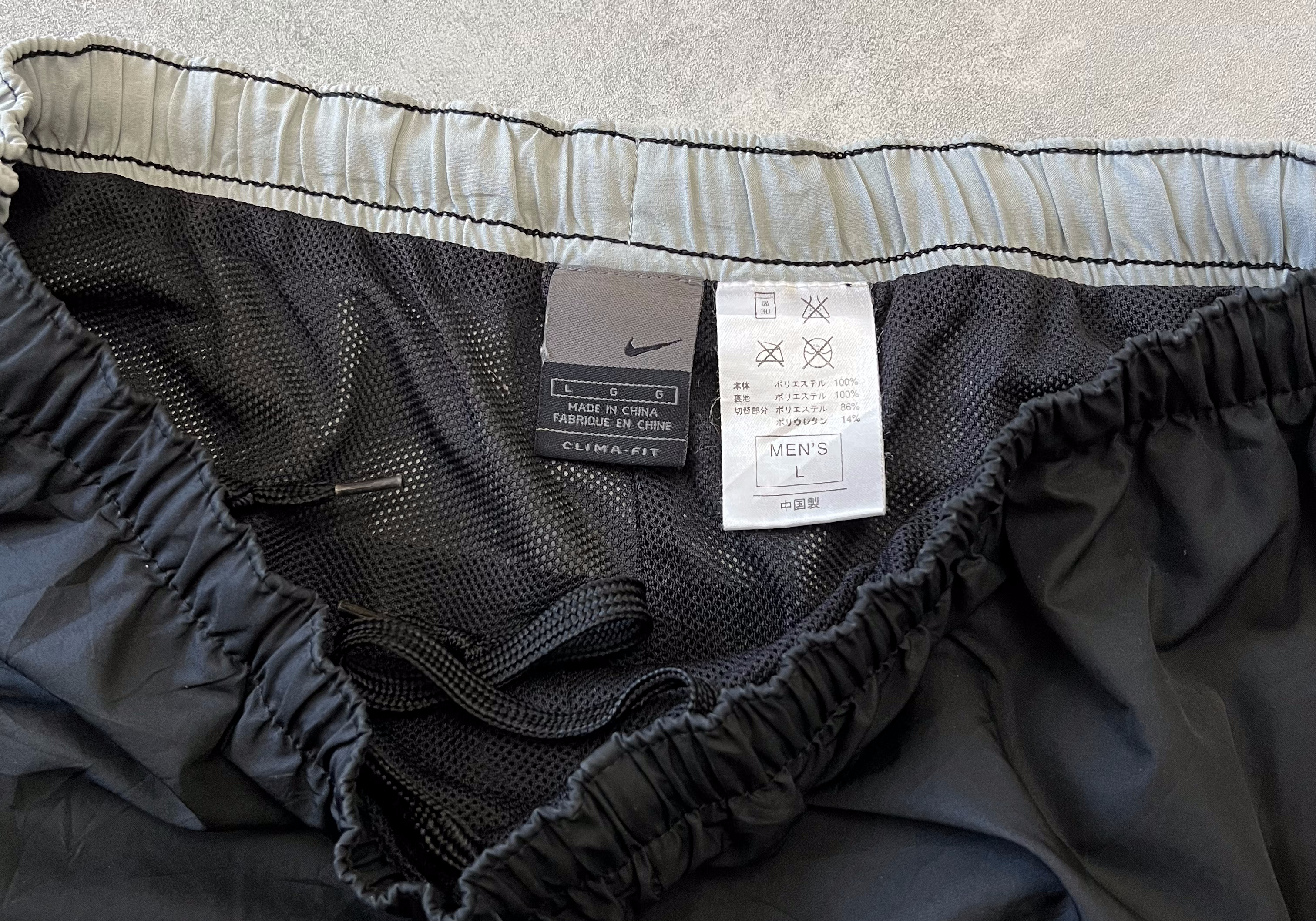 Nike 2000s double swoosh trackpants (L)