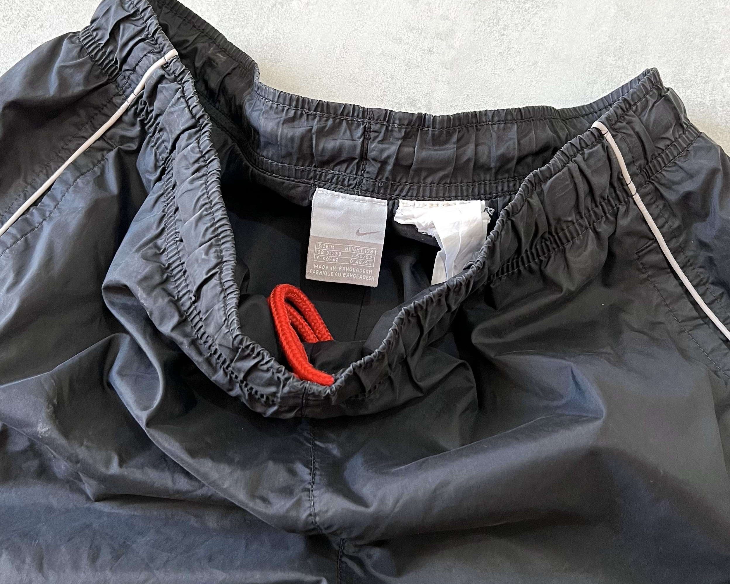 Nike 2000s track pants (L)