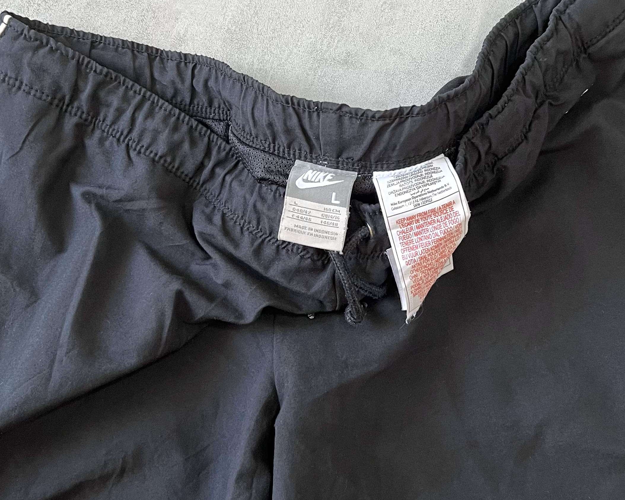 Nike 2000s double swoosh joggers (L)