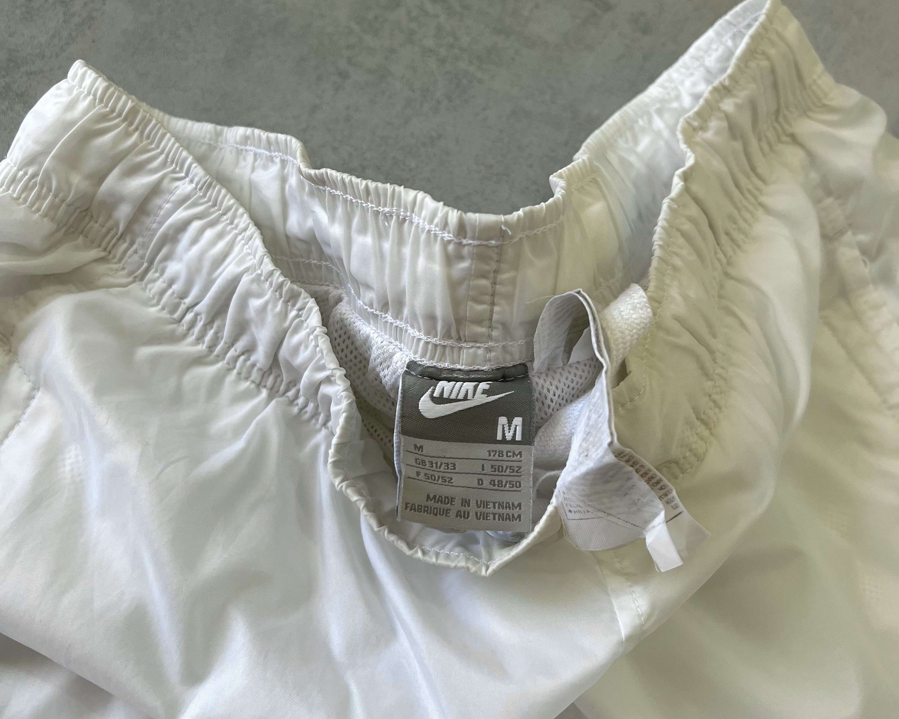 Nike RARE 2000s double swoosh track pants (M)