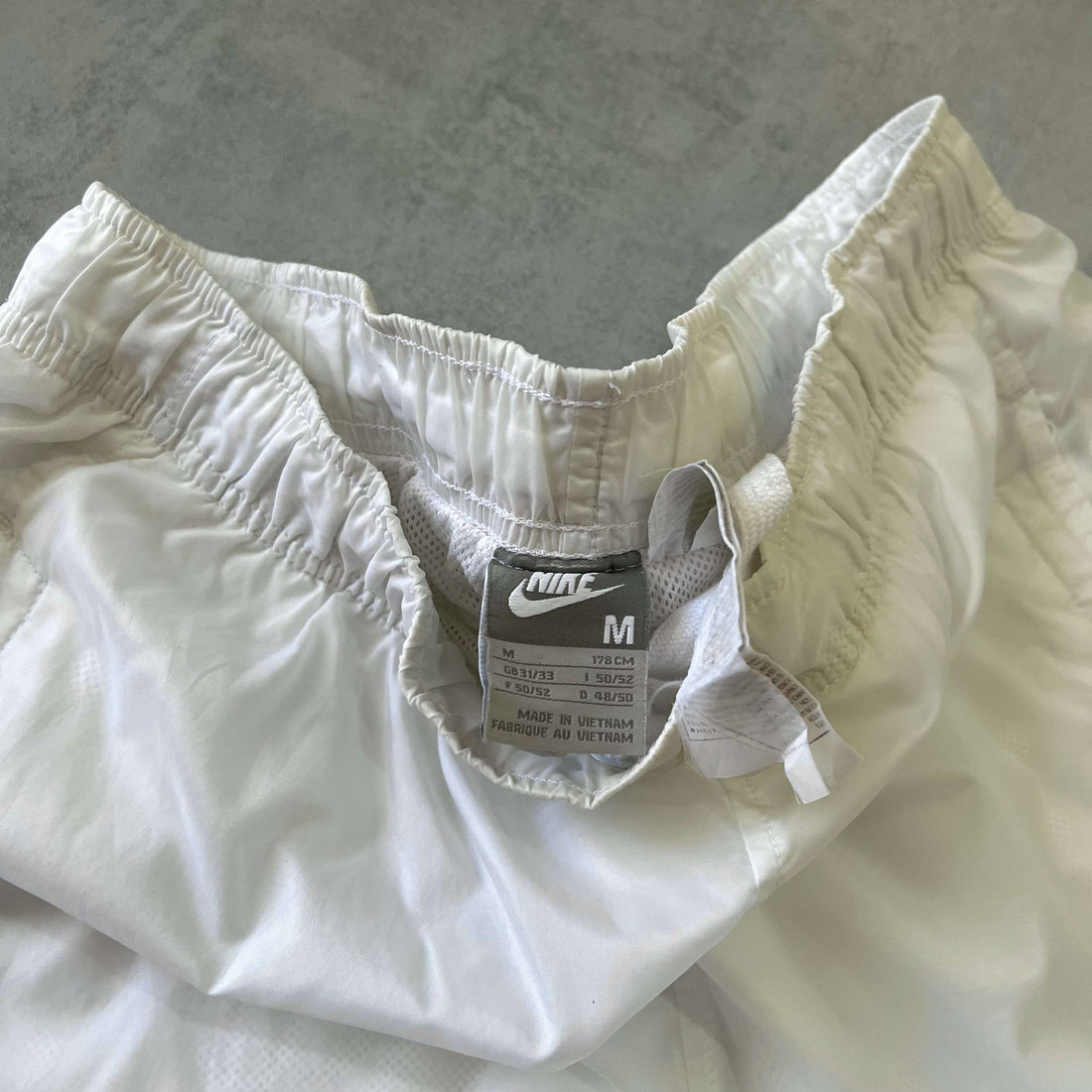 Nike RARE 2000s double swoosh trackpants (M)